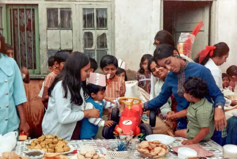 Birthday celebrations outside Walji-Adatia family home in Jinja, Uganda. © Photo courtesy the Walji-Adatia family