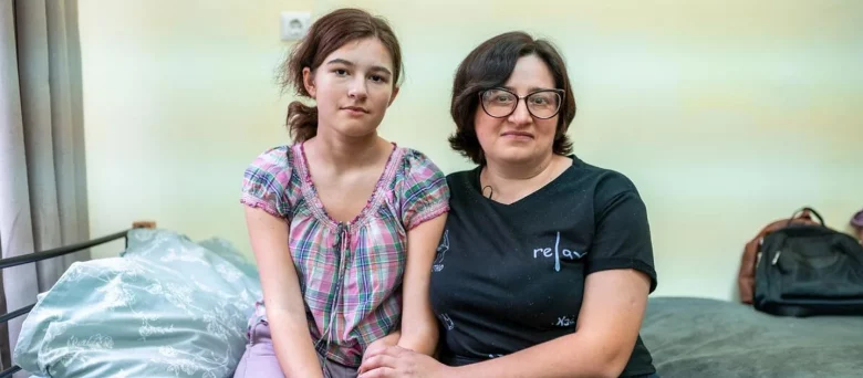 Natalia Artiukh and her daughter, who moved to the hospital from Zaporizhia, Ukraine, in June with other family members.© UNHCR/Nikolay Stoykov