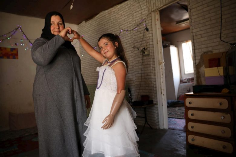 Sarah and her mother Safiyah in their apartment in the Lebanese capital Beirut. © UNHCR/Houssam Hariri