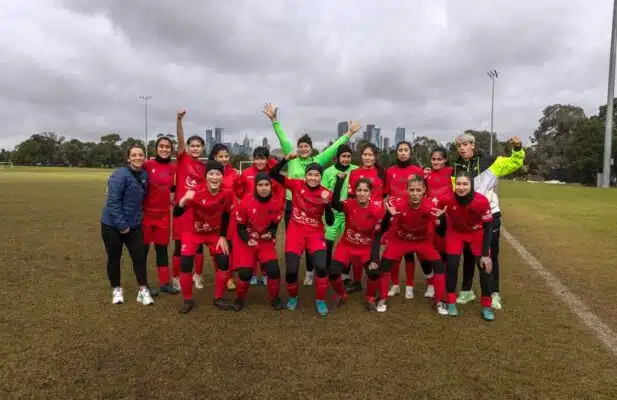 Group photo of women's soccer team.