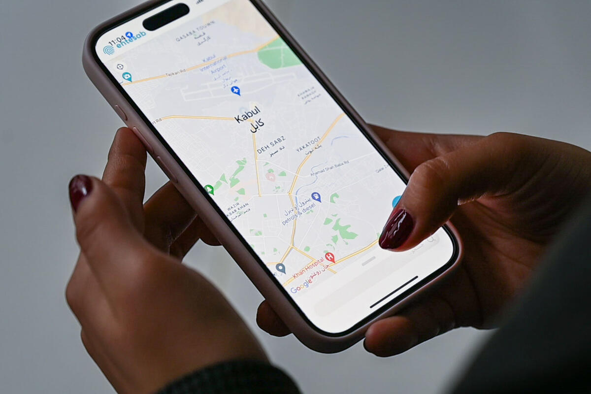 A close up of a phone, open to a google map of Kabul