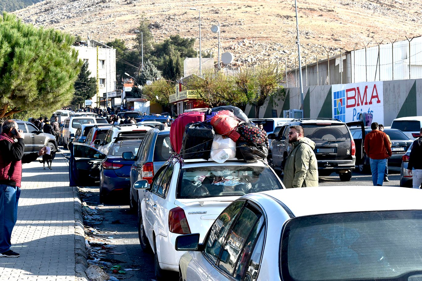 Long lines of vehicles queue up at a border crossing between Lebanon and Syria.
