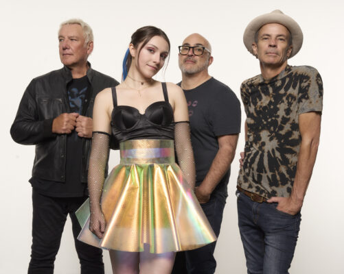 Envy of None band members Alex Lifeson, Maiah Wynne, Alfio Annibalini, Andy Curran pose for a photo.